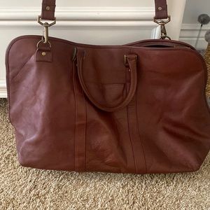 Genuine leather duffel bag in perfect condition never used